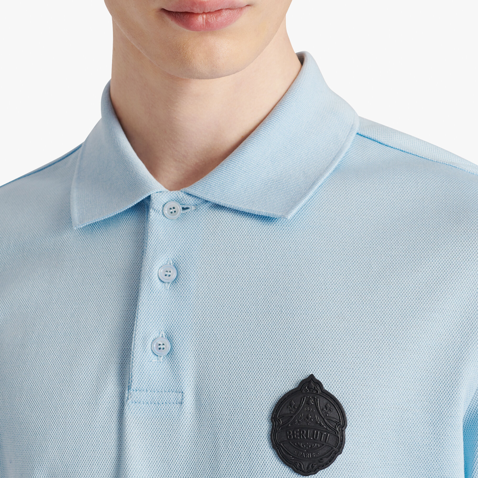 sky blue polo shirt