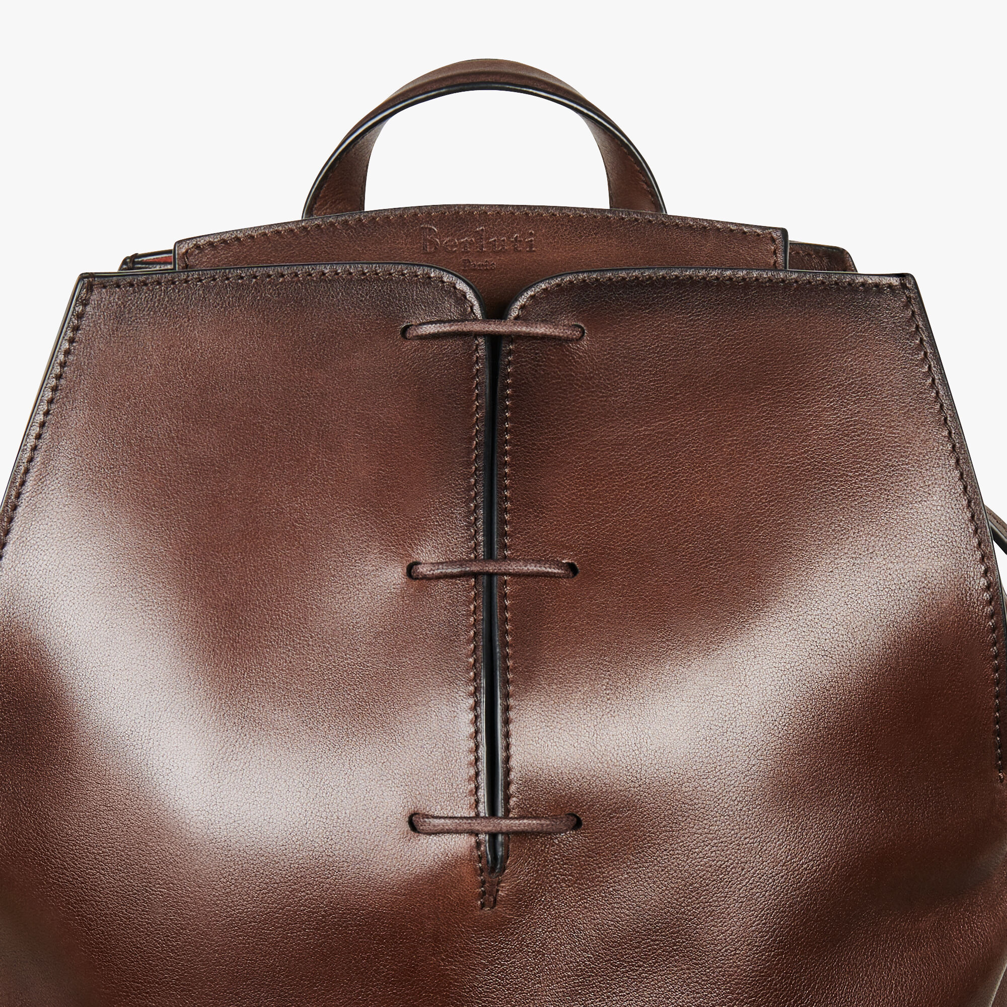 silver backpack leather