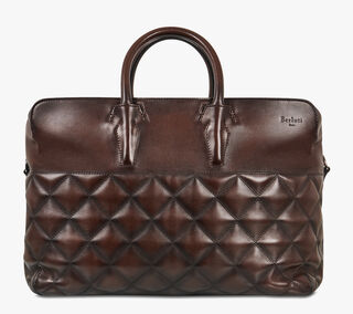 Travel bag collections by Berluti